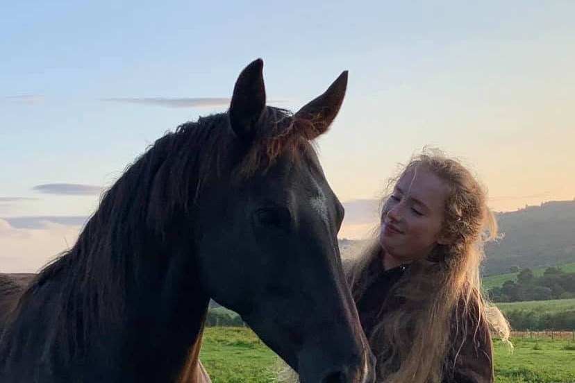A quiet moment with Halle at the gate